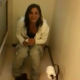 Some guy films his girlfriend taking a shit while sitting on a toilet. There are no audible pooping sounds, and the girl denies that she is pooping. The smell described by the guy tells another story, and he is compelled to give her a kiss. We would, too!
